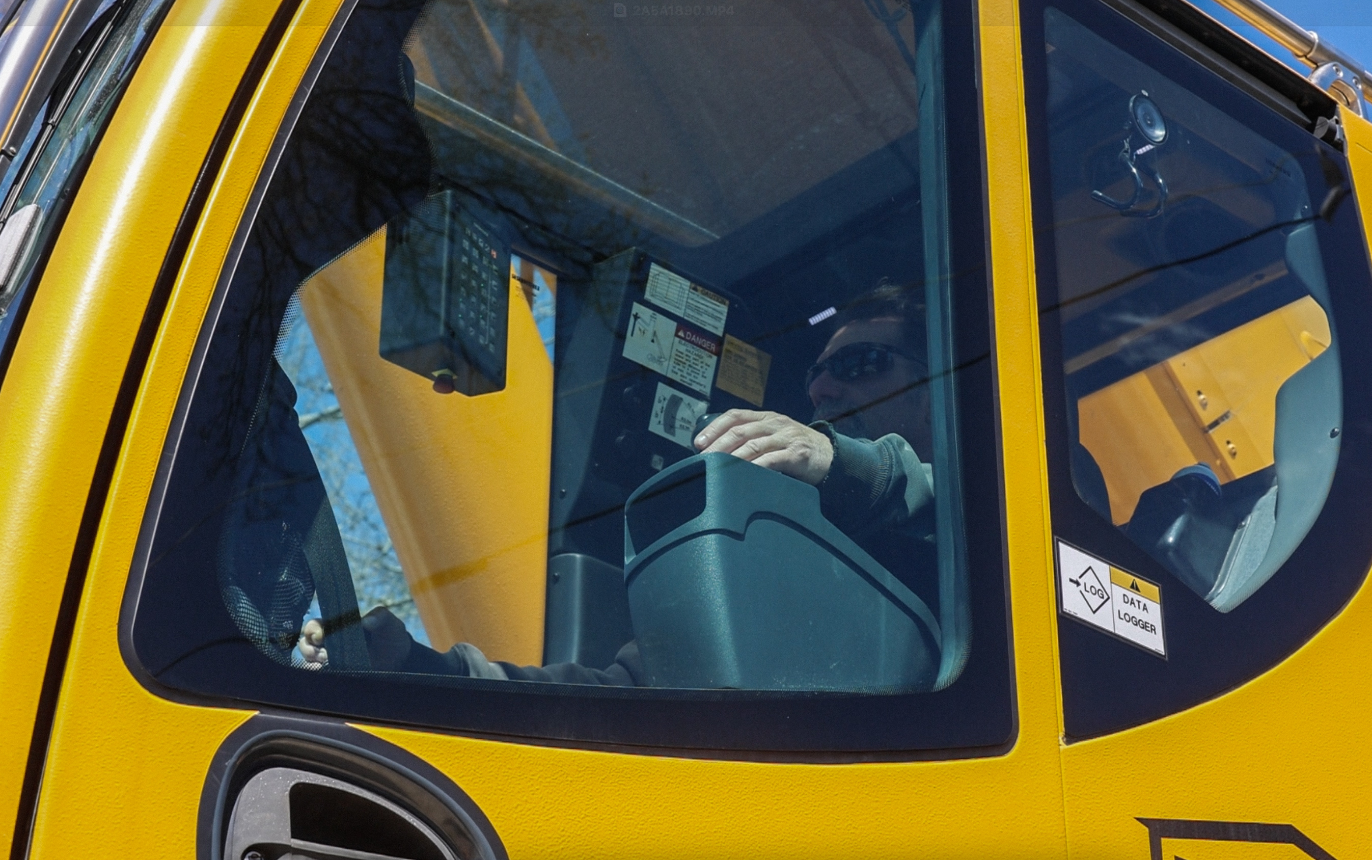 Operator in CAT excavator cab