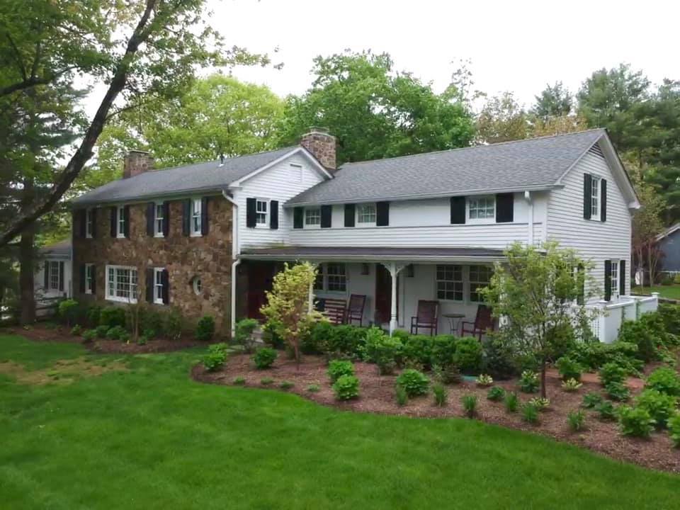 Foundation landscaping with shrubs and mulch beds