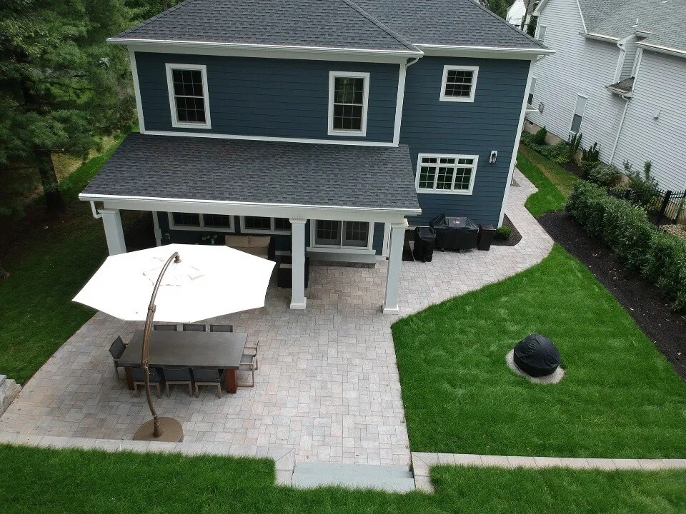 Complete backyard patio design with covered porch